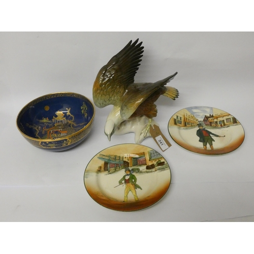 241 - A Carlton ware fruit bowl, two Doulton Dickens ware plates and a continental figure of an eagle