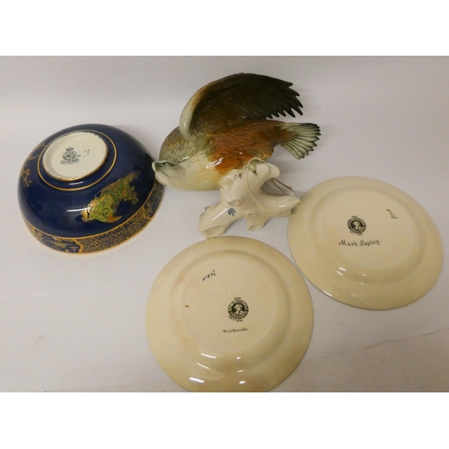 241 - A Carlton ware fruit bowl, two Doulton Dickens ware plates and a continental figure of an eagle