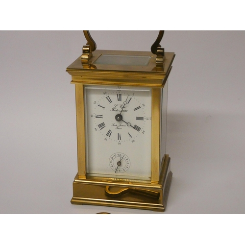 243 - Good quality gilt brass French carriage clock with alarm, the white dial inscribed L'Epee France, co... 