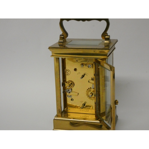 243 - Good quality gilt brass French carriage clock with alarm, the white dial inscribed L'Epee France, co... 