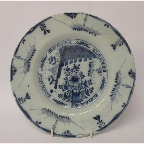 247 - A Bristol Delft antique blue and white plate, diameter of plate  25cms