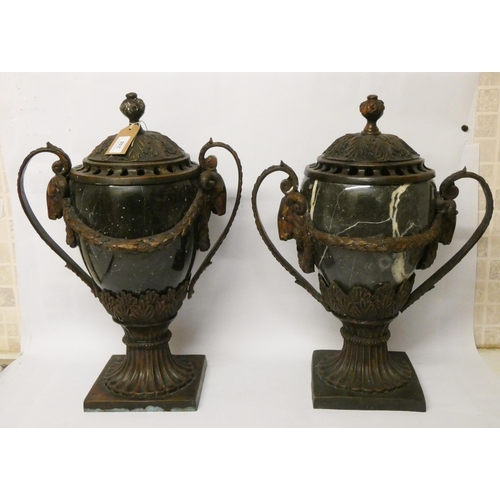 248 - A large pair of Empire style marble and bronze mounted twin handled vases with rams head and swag de... 