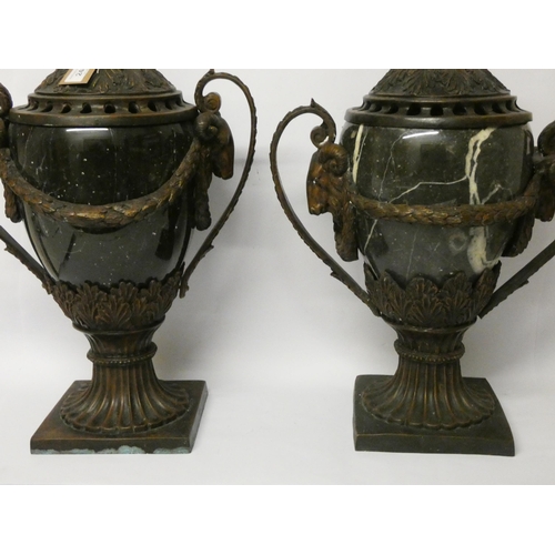 248 - A large pair of Empire style marble and bronze mounted twin handled vases with rams head and swag de... 