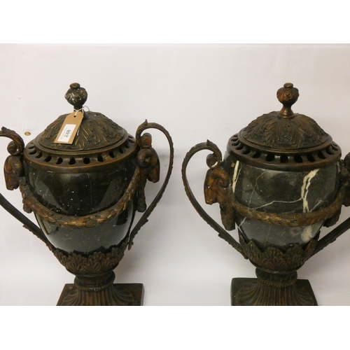 248 - A large pair of Empire style marble and bronze mounted twin handled vases with rams head and swag de... 