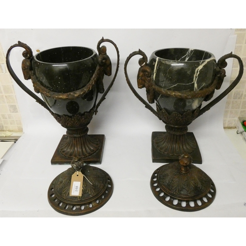 248 - A large pair of Empire style marble and bronze mounted twin handled vases with rams head and swag de... 