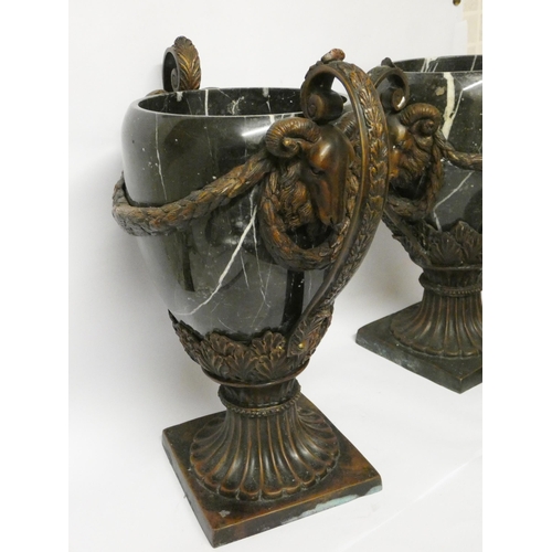 248 - A large pair of Empire style marble and bronze mounted twin handled vases with rams head and swag de... 