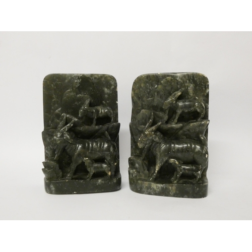 249 - A pair of carved soapstone bookends