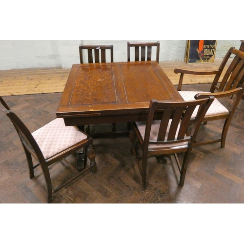 158 - A square oak drawer leaf dining table on refectory style base together with5 chairs - four dining ch... 