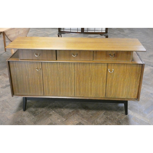 16 - A 1960's GPlan mahogany sideboard, fitted three drawers and cupboards, 5' wide