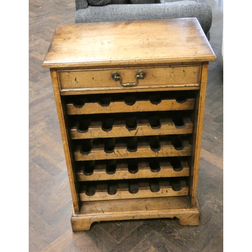 162 - A Titchmarsh & Goodwin oak wine rack for 25 bottles with one drawer over, 2' wide