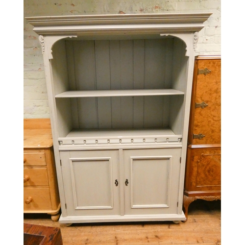 188 - A vintage duck egg blue painted pine cabinet fitted shelf and cupboards under, 44