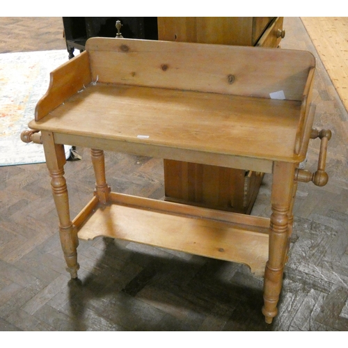 190 - A stripped pine tray topped wash stand table with under tier and towel rail sides, 3' wide