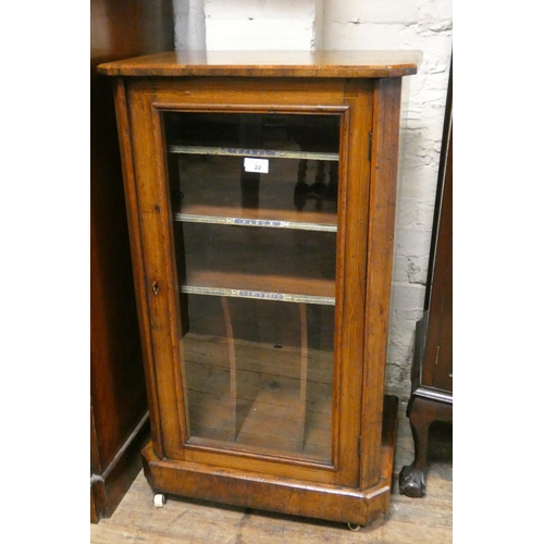 22 - A Victorian inlaid walnut glazed music cabinet, 21