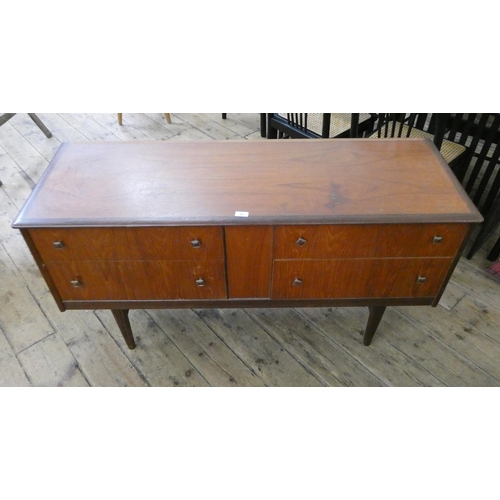 72 - A low teak chest fitted four drawers, 4'6 wide