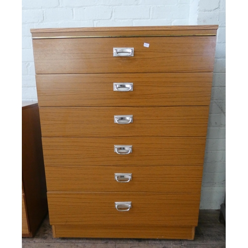 81 - A modern teak chest of six long drawers, 2'6 wide together with a three drawer teak chest of drawers