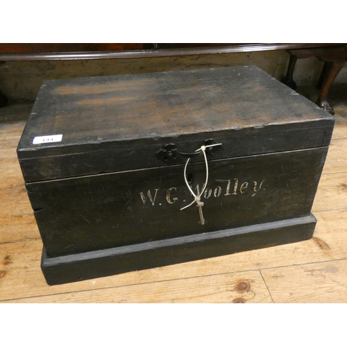 144 - A small stained pine box with interior tray fitted with iron handles, 19 1/2