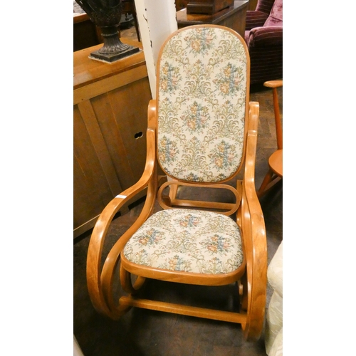 175 - A bentwood rocking elbow chair with tapestry upholstered seat and back