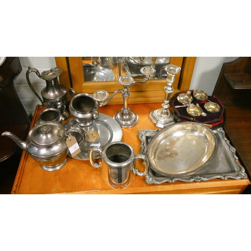 53 - Trays, teapot, candlesticks and other assorted plated items