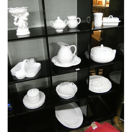 61 - A large selection of assorted Italian white china - leaf moulded plates, dishes, jug and basin etc