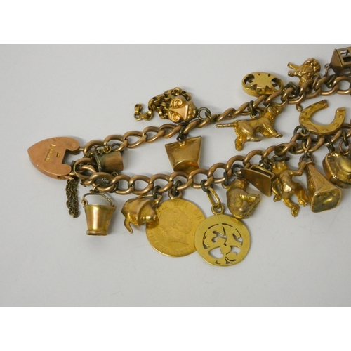 410 - 9ct gold curb link charm bracelet set with 1820 half sovereign, set with 19 other charms to a heart ... 