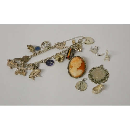 421 - Modern silver charm bracelet, loose charms, cameo brooch in 800 standard frame etc