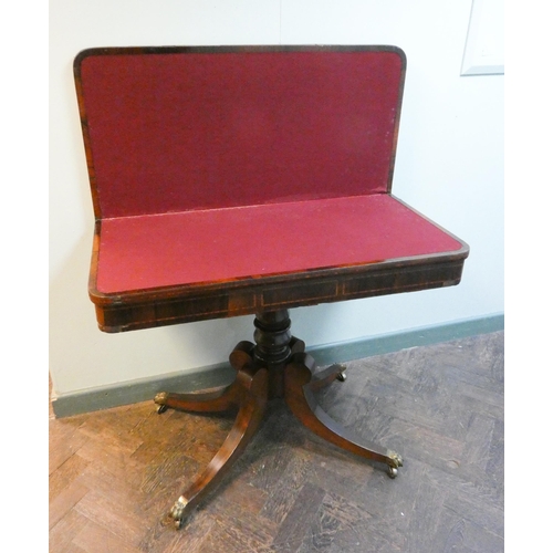 27 - Early 19th century rosewood inlaid fold over top card table on down swept pillar base, red baize lin... 