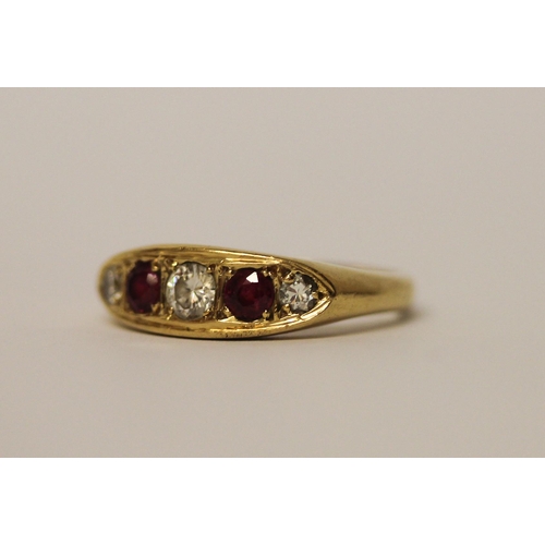 407 - 18ct gold Victorian style ruby and diamond gypsy ring, hallmarked, ring size N. 5.4g