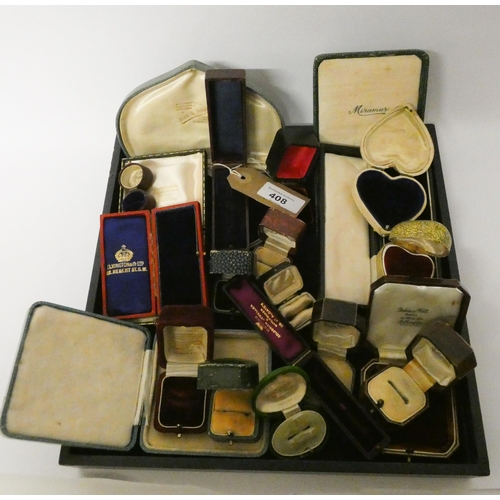 408 - A collection of jewellery boxes to include heart and egg shaped examples, the 20 boxes dating from t... 