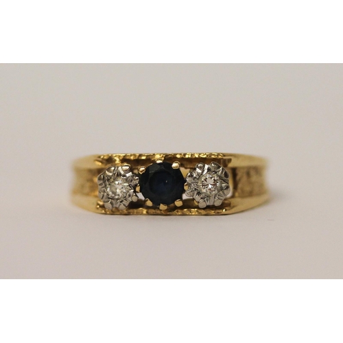 411 - 18ct gold three stone sapphire and diamond ring. Hallmarked, ring size O, 3.6 grams