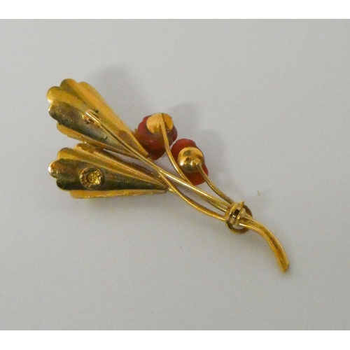 416 - 18ct gold and carved coral flower spray brooch, 78ml long, gross weight 8.4gms