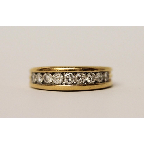 451 - 18ct yellow gold half hoop eternity ring, channel set with nine brilliant cut diamonds, hallmarked, ... 