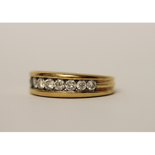 451 - 18ct yellow gold half hoop eternity ring, channel set with nine brilliant cut diamonds, hallmarked, ... 