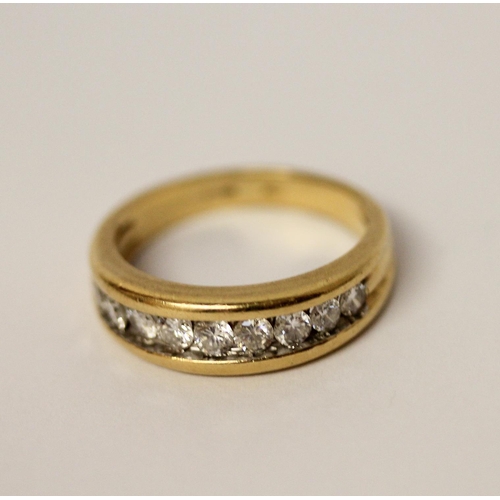 451 - 18ct yellow gold half hoop eternity ring, channel set with nine brilliant cut diamonds, hallmarked, ... 