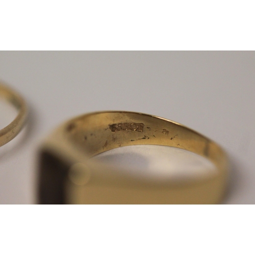 455 - 14k gold smoky quartz signet ring, size I and a 9ct wishbone ring. Gross weight of lot 3.9g