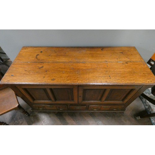 28 - Victorian oak mule chest cabinet, with fielded inlaid doors above three drawers.