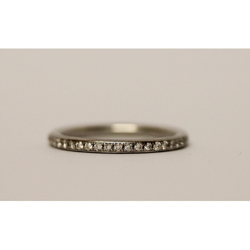 385 - A platinum and diamond full eternity stacking ring, ring size N 1/2, weight 3.6g