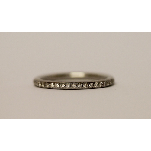 385 - A platinum and diamond full eternity stacking ring, ring size N 1/2, weight 3.6g