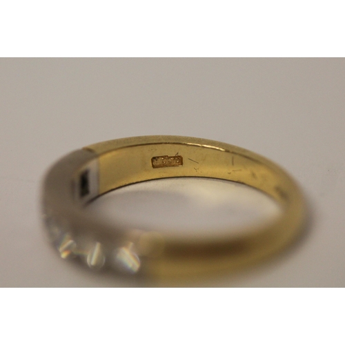 388 - A diamond half hoop eternity ring, channel set with seven brilliant cut diamonds, in 18ct yellow gol... 