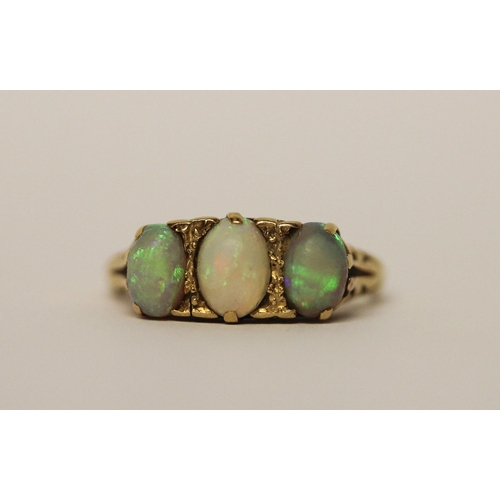 391 - 19th century three stone opal ring, on 18ct gold band, marked 18ct, ring size N, weight 4.5g