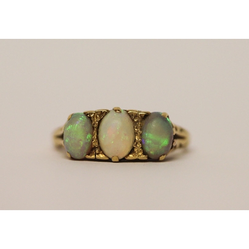 391 - 19th century three stone opal ring, on 18ct gold band, marked 18ct, ring size N, weight 4.5g