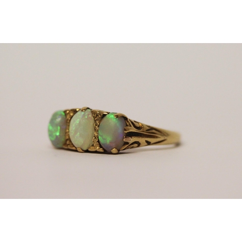 391 - 19th century three stone opal ring, on 18ct gold band, marked 18ct, ring size N, weight 4.5g