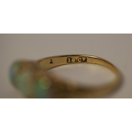 391 - 19th century three stone opal ring, on 18ct gold band, marked 18ct, ring size N, weight 4.5g