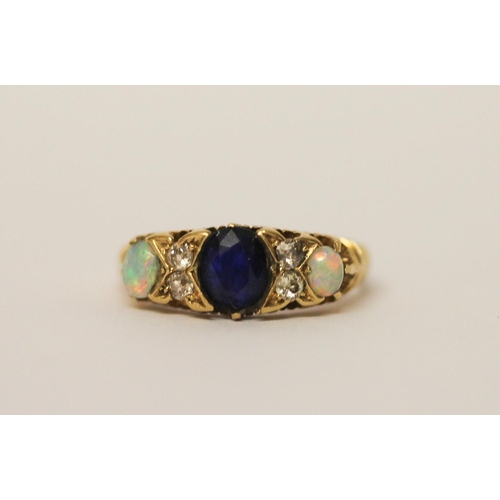 392 - An antique opal, diamond and sapphire ring, on hallmarked 18ct gold band, ring size K, weight 3.4g