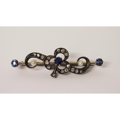 395 - An antique sapphire diamond and pearl brooch in an unmarked precious yellow and white metal setting,... 