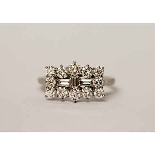 435 - Rhapsody - A large modern diamond dress ring, a large cluster rectangular panel set with brilliant a... 