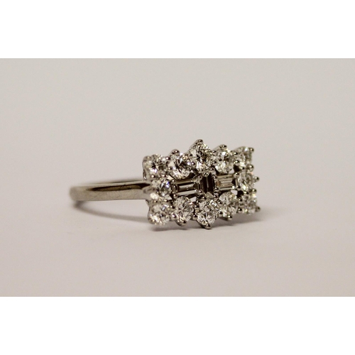 435 - Rhapsody - A large modern diamond dress ring, a large cluster rectangular panel set with brilliant a... 