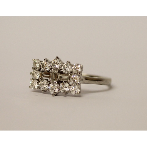 435 - Rhapsody - A large modern diamond dress ring, a large cluster rectangular panel set with brilliant a... 