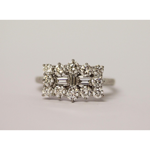 435 - Rhapsody - A large modern diamond dress ring, a large cluster rectangular panel set with brilliant a... 