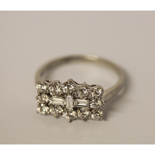 435 - Rhapsody - A large modern diamond dress ring, a large cluster rectangular panel set with brilliant a... 