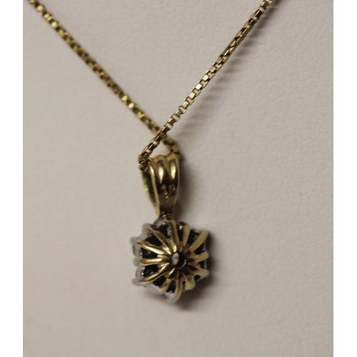 445 - A diamond daisy seven stone pendant, hallmarked 18ct gold mount on a fine 18ct yellow gold box link ... 